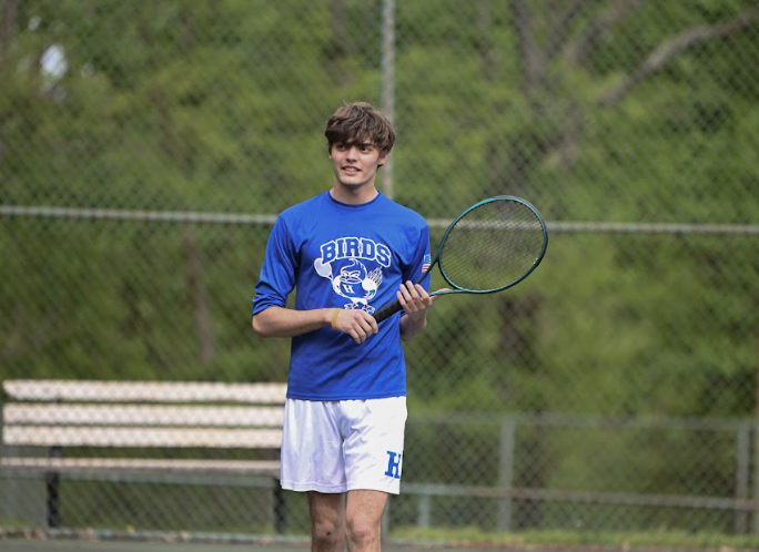 Ryder Perme(12) walks away after he scores a point. 
